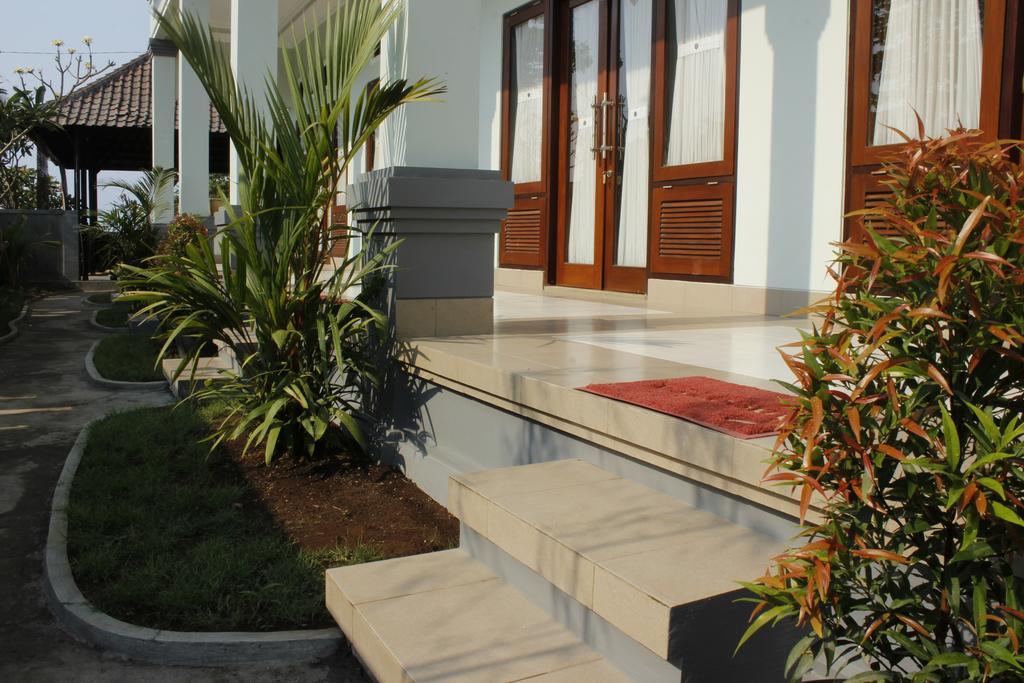 Hotel MaeMae Beach House Nusa Penida Zimmer foto